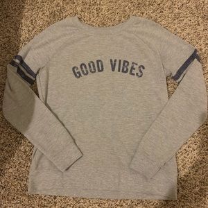 Soft, Long sleeve “Good Vibes” shirt.